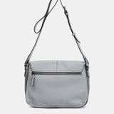 Bandolera en piel gris