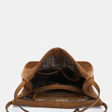 Shoulder bag in cognac suede