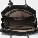 Bolso de mano en piel negra
