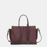 Bolso de mano en piel burdeos