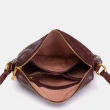 Bandolera en piel y serraje burdeos