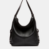 Bolso multifuncional en piel negra