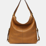Multifunctional bag in cognac leather