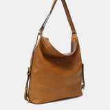 Multifunctional bag in cognac leather