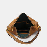 Multifunctional bag in cognac leather