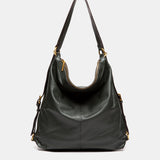 Bolso multifuncional en piel verde