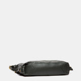 Bolso multifuncional en piel verde