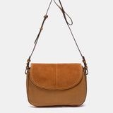 Bandolera en piel y serraje cognac