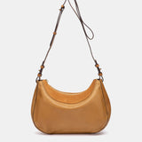 Bandolera en piel y serraje cognac