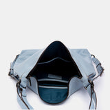 Bolso multifuncional en piel azul claro
