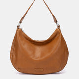 Kleine Umhängetasche aus cognacfarbenem Leder