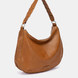 Kleine Umhängetasche aus cognacfarbenem Leder