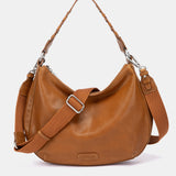 Kleine Umhängetasche aus cognacfarbenem Leder