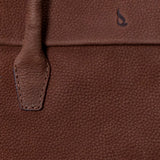 Handtasche aus braunem Leder.
