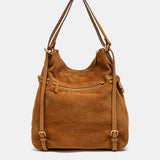 Borsa multifunzionale in camoscio color cognac.