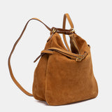 Borsa multifunzionale in camoscio color cognac.