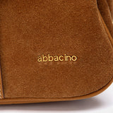 Schultertasche aus cognacfarbenem Rauleder.