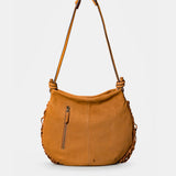Borsa a spalla in pelle con frange color cuoio.