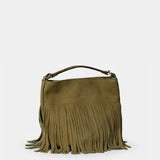 Handtasche aus Leder mit grünen Fransen.