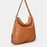 Bolso multifuncional en piel cognac
