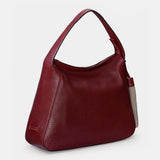 Bolso de hombro en piel troquelada burdeos