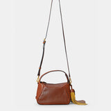 Bolso de mano en piel troquelada cognac