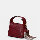 Bolso de mano en piel troquelada burdeos