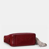 Bolso de mano en piel troquelada burdeos