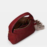Bolso de mano en piel troquelada burdeos