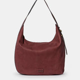 Burgundy suede shoulder bag.