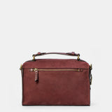 Burgundy suede crossbody bag.