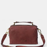Burgundy suede crossbody bag.