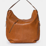 Cognac leather shoulder bag.