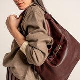 Burgundy leather shoulder bag.