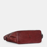 Burgundy leather shoulder bag.