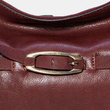 Burgundy leather shoulder bag.