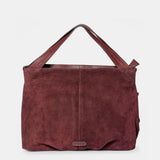 Shopper aus bordeauxfarbenem Veloursleder.