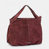 Shopper aus bordeauxfarbenem Veloursleder.
