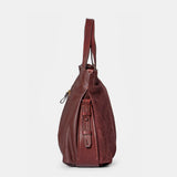 Shopper aus bordeauxfarbenem Veloursleder.