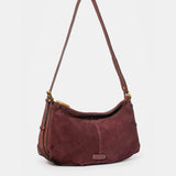 Burgundy suede shoulder bag.