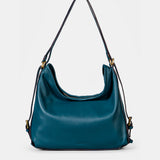Multifunctional bag in blue leather.