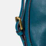Multifunctional bag in blue leather.