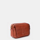 Bandolera pequeña en piel cognac
