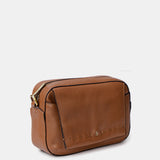 Bandolera pequeña en piel cognac