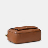 Bandolera pequeña en piel cognac