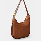 Schultertasche aus cognacfarbenem Veloursleder.