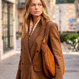 Cognac suede shoulder bag.