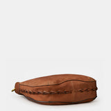 Schultertasche aus cognacfarbenem Veloursleder.