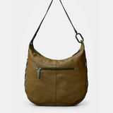 Grüne Schultertasche aus Veloursleder.