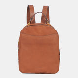 Rucksack aus cognacfarbenem Veloursleder.
